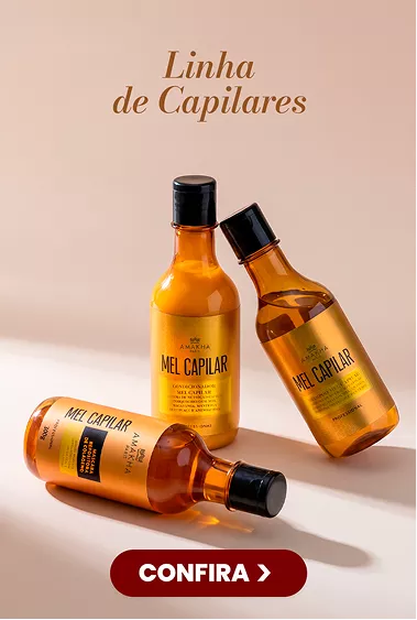 Linha de Capilares: três frascos de Mel Capilar Amakha Paris sobre fundo rosado